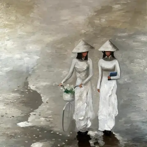 Dames vietnamiennes en Ao Dai blanc